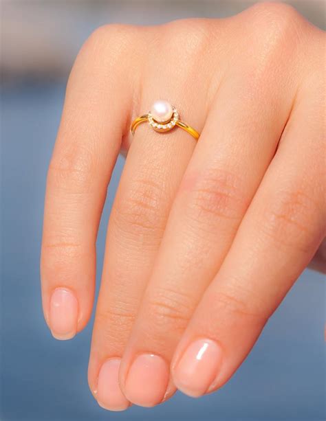 Pearl proposal ring - Huge Queen Conch Pearl & Diamond 18k Solid White Gold Ring (Customize) Pearls Strombus Gigas, Natural Queen Conch Pearl, Engagement Ring (616) $ 14,300.00. FREE shipping Add to Favorites Chic Bridesmaid Gift | 10-15mm Lustrous South Sea Golden Pearl Earrings | 18K Gold Dainty South Sea Golden Pearl Earrings ...